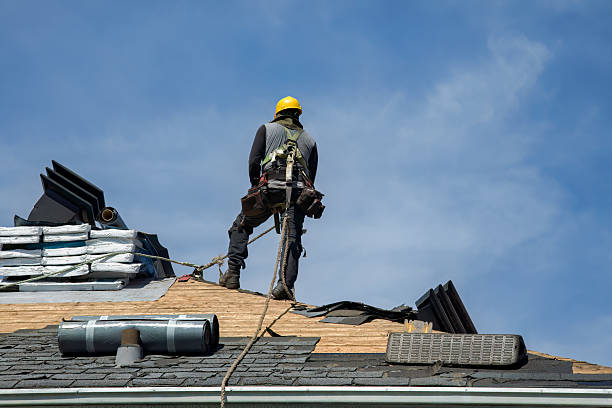Professional Roofing technician working in Midfield, AL